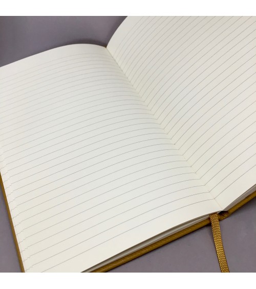 Carnet Moleskine couverture cuir, ligné. Intérieur. L'Ecritoire, Lausanne.