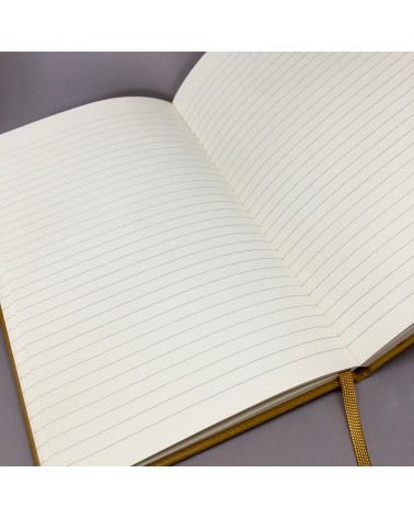 Carnet Moleskine couverture cuir, ligné. Intérieur. L'Ecritoire, Lausanne.