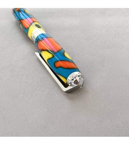 Roller Récife Mystique Soyouz Amazone (tons oranges, noirs, jaune vif et bleu clair vif)