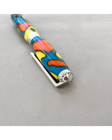 Roller Récife Mystique Soyouz Amazone (tons oranges, noirs, jaune vif et bleu clair vif)