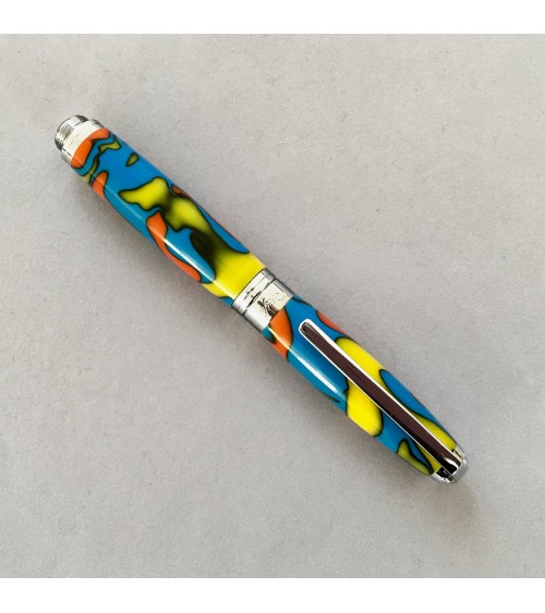 Roller Récife Mystique Soyouz Amazone (tons oranges, noirs, jaune vif et bleu clair vif)