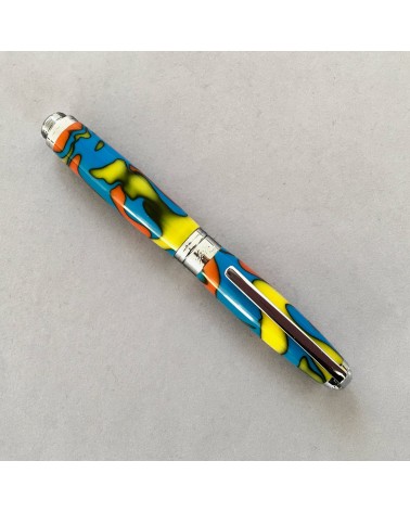 Roller Récife Mystique Soyouz Amazone (tons oranges, noirs, jaune vif et bleu clair vif)