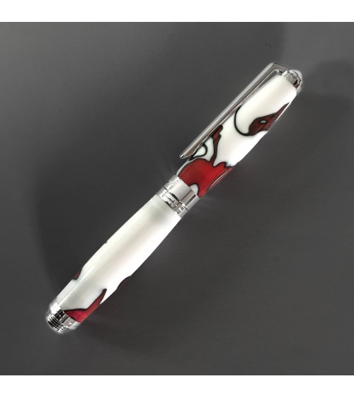 Roller Récife Mystique Soyouz Volcano (volutes noires et rouge foncé sur un fond blanc), fabriqué en France