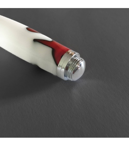 Roller Récife Mystique Soyouz Volcano (volutes noires et rouge foncé sur un fond blanc), fabriqué en France